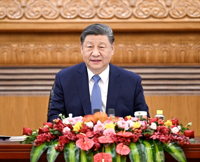 3月28日上午，国家主席习近平在北京人民大会堂会见国际工商界代表。新华社记者 李学仁 摄